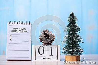 New Year Resolution word on notebook and January calendar. time for a New start, Goal, Plan, Action and Mission Concept Stock Photo