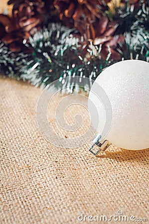 New Year's and Christmas balls with cones on wood background Stock Photo