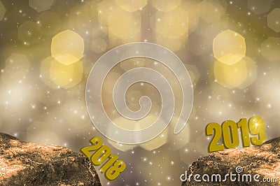 New Year`s Eve 2018 and Starting 2019 Brightness Theme of Gold,happy new year with sparkling golden light bokeh and glittering Stock Photo