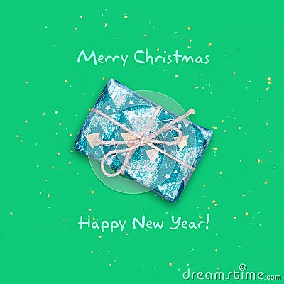 New Year`s gift on a green background. Christmas, New Years` background Stock Photo