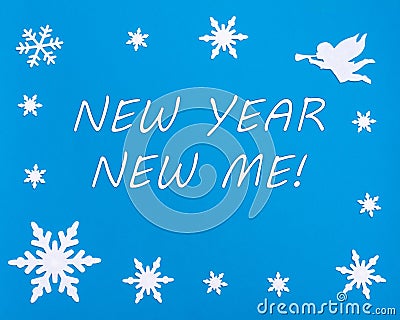 New Year's motivational card. Text NEW YEAR NEW Me on a blue background with Christmas snowflakes, a white angel Stock Photo