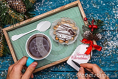 New Year`s photo of tea with picture of snowflake, cake Stock Photo