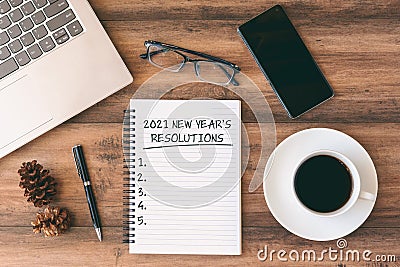 2021 New Year`s Resolutions text on note pad Stock Photo