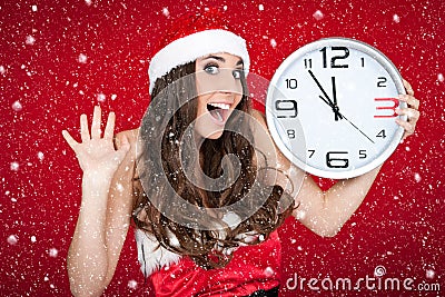 Almost new year - santa girl,clock , snow concept Stock Photo