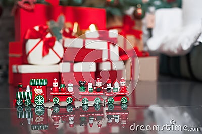 New Year's train on background of gifts and Christmas tree., Stock Photo