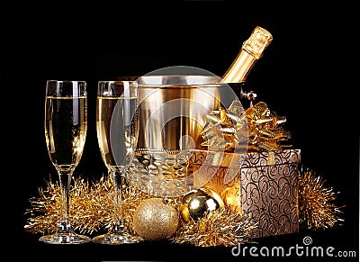 New Years Eve. Celebration. Champagne and Presents over black Stock Photo