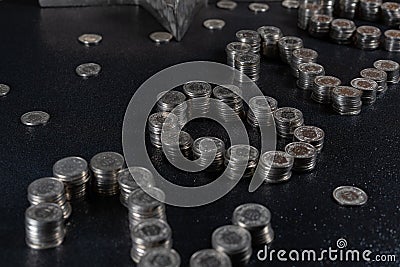New Years 2020 graphic made from coins from Switzerland on a black shiny ground with silver star for concept Stock Photo