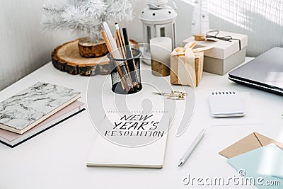 New years resolution, New goals. Handwritten Text New years resolution in open notepad on the table. Start new year Stock Photo