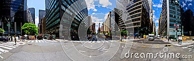 NEW YORK CITY - June 15, 2018: Standing out in the traffic looking down 4th Avenue between the skyscrapers Editorial Stock Photo