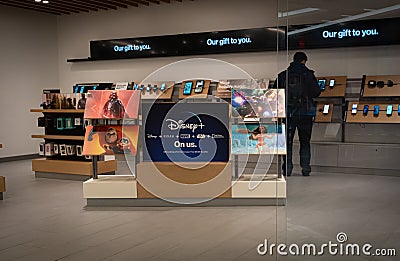 New York City, November 2019: Disney plus ad inside a Verizon store. Editorial Stock Photo