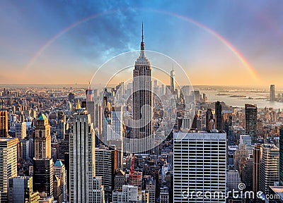 New York City skyline with urban skyscrapers and rainbow. Stock Photo