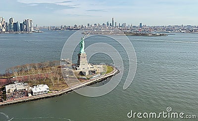 The aerial view of Statue of Liberty and Manhattan, taken from a helicopter ride Editorial Stock Photo