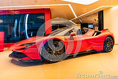 New York City, USA - August 09, 2023: Ferrari SF90 Stradale convertible supercar sports car in showroom, side view Editorial Stock Photo