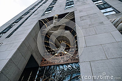 Underside perspective view to exterior Art Deco details of Rockefeller Center building in midtown Manhattan Editorial Stock Photo