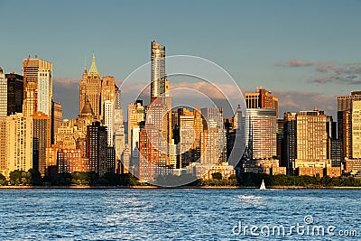 New York City / USA - JUL 18 2018: Buildings facade and aparmetns in Midtown Manhattan at sunset view from Hudson riverside Editorial Stock Photo