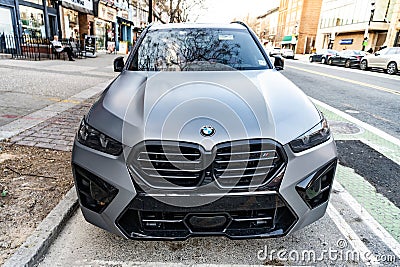 New York City, USA - March 15, 2024: BMW X6 modern grey car parked outside, front view Editorial Stock Photo