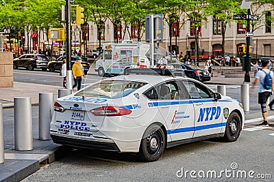 New York City, USA - May 05, 2023: NYPD responder Ford hybrid car on a street of New York Editorial Stock Photo