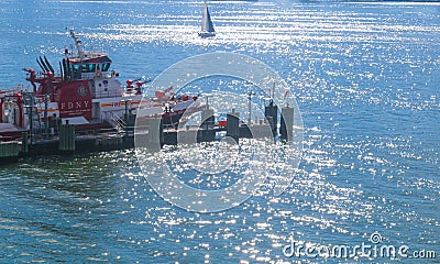 New York fire boat on the bright Hudson River surface Editorial Stock Photo