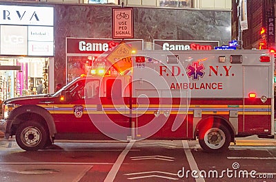 New York Fire Department Ambulance Ready to Go After Emergency Call. Sirens and Lights Are On Editorial Stock Photo