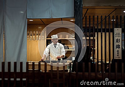 NEW YORK- JANUARY 16: Sushi chef at work in Japanese village in Brooklyn`s Industry City Editorial Stock Photo