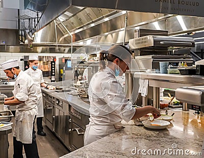 Executive Sous Chef Christin Bourgeois in the kitchen of newest Micheline Star Chef Daniel Boulud`s restaurant Le Pavillon Editorial Stock Photo