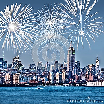 New York Manhattan skyline at night, fireworks in the background, american US celebration and party Editorial Stock Photo