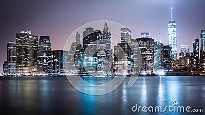 New York Manhatten Skyline by Night Stock Photo