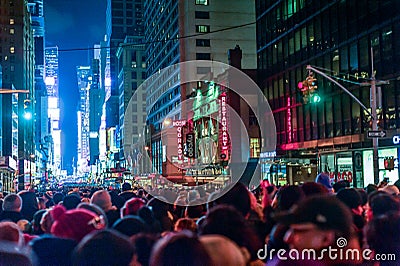 NEW YORK, NEW YORK - DECEMBER 31, 2013: New York Street Before New Years Eve. People Waiting Ball Drop. Editorial Stock Photo