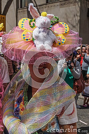 New York, New York: A smiling woman wears an elaborate Easter bonnet Editorial Stock Photo