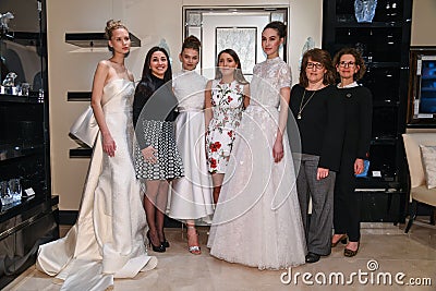 Models, designer Gracy Accad C and Atelier PR staff prosing during the Gracy Accad Spring 2020 bridal presentation Editorial Stock Photo