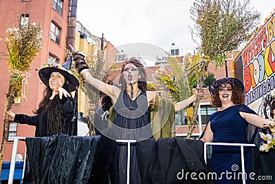 Group of cute and scary witches at NYC Village Halloween parade Editorial Stock Photo