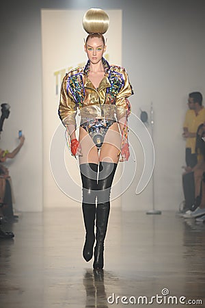 NEW YORK, NY - SEPTEMBER 11: A model walks the runway at The Blonds show during Spring 2014 Made Fashion Week Editorial Stock Photo