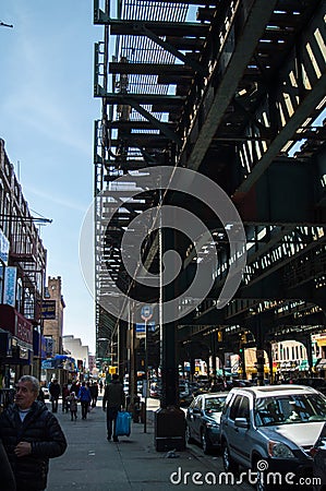 New York, NY USA - April 2016: streets of Brighton Beach under the metal transport bridge Editorial Stock Photo