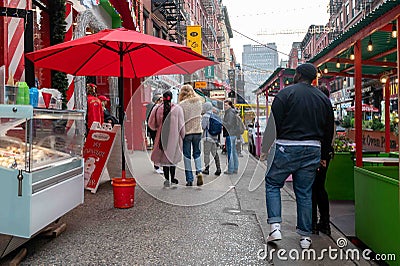 Busy restaurant street scene with gelato Little Italy New York Editorial Stock Photo