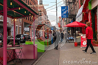 Colorful restaurant busy street scene Little Italy New York Editorial Stock Photo