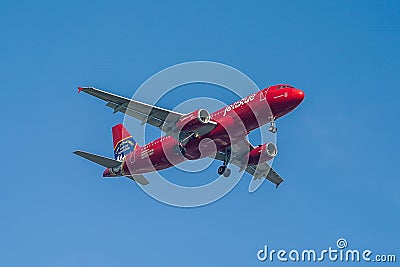 JetBlue A320 in NYC Fire Department Livery descending for landing at JFK International Airport in New York Editorial Stock Photo