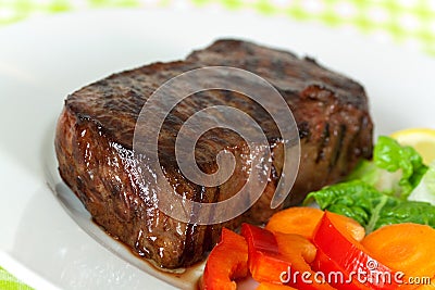 New York Steak- meat on Green Beans,Carrot,Pepper Stock Photo