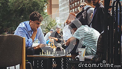 People playing chess at a park Editorial Stock Photo