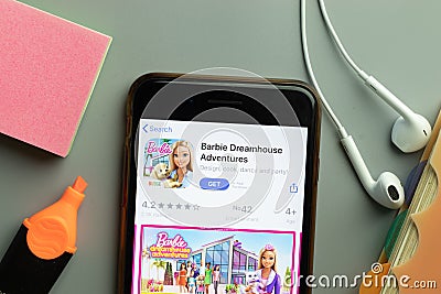 New York, USA - 1 December 2020: Barbie Dreamhouse Adventures mobile app icon on phone screen top view, Illustrative Editorial Editorial Stock Photo