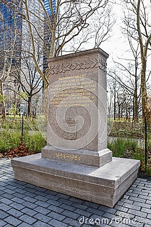 New York, USA. The limestone stele Walloon Settlers Memorial, in Battery Park. Editorial Stock Photo