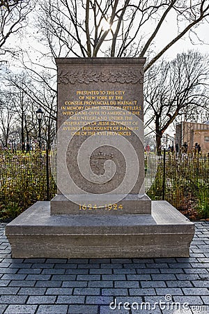 New York, USA. The limestone stele Walloon Settlers Memorial, in Battery Park. Editorial Stock Photo
