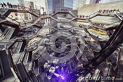 New York, USA - MARCH 18, 2019: Modern architecture building Vessel spiral staircase is the centerpiece of the Hudson Yards in Ne Editorial Stock Photo