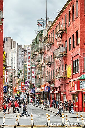 Bustling street in the Manhattan Chinatown, one of the oldest Chinese ethnic enclaves. Editorial Stock Photo