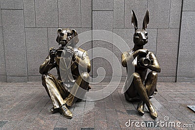 NEW YORK, USA - MAY 5 2019 - Dog and bunny photographer statue Editorial Stock Photo