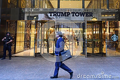 New York, USA - May 31 2018: Pedestrian walk past the front entrance Trump Tower on Fifth Avenue in New York. Editorial Stock Photo