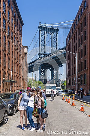 Tourists visiting Dumbo in Brooklyn Editorial Stock Photo