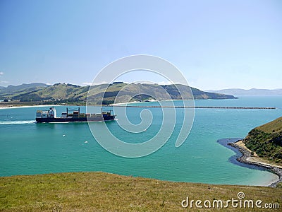 New Zealand: container ship Otago Harbour groyne Stock Photo