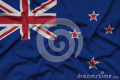 New Zealand flag is depicted on a sports cloth fabric with many folds. Sport team banner Stock Photo