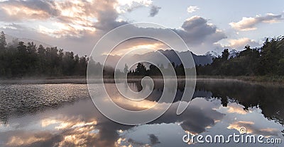 New Zealand lake view refection with morning sunrise sky Stock Photo