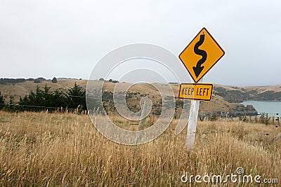 New Zealand Landscape with Keep Left Sign Stock Photo
